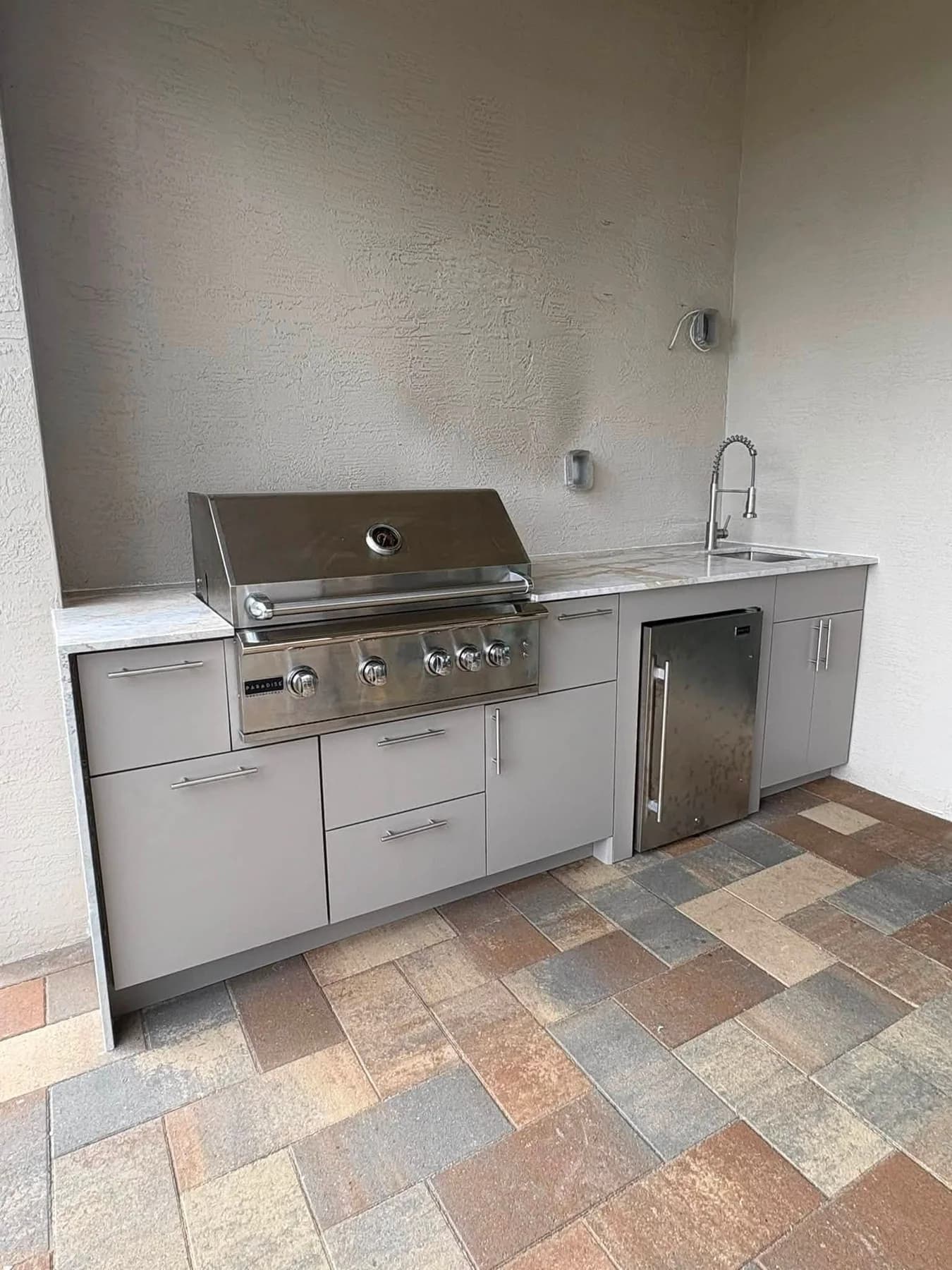Outdoor-kitchen gallery photo showing HDPE cabinetry