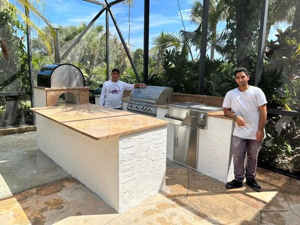 Completed outdoor kitchen with integrated cooking appliances