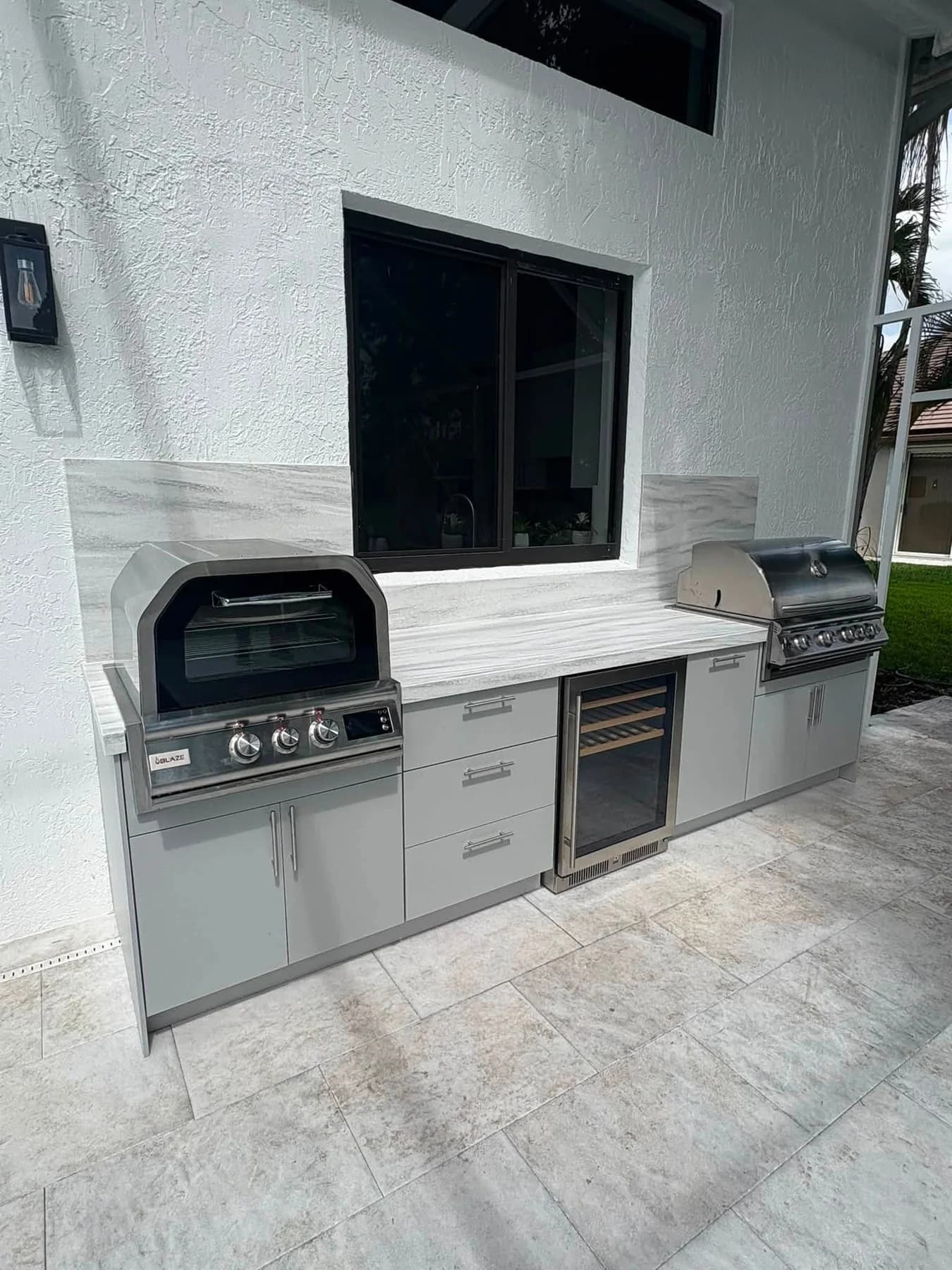 Apex kitchen with multiple cooking appliances and refrigeration